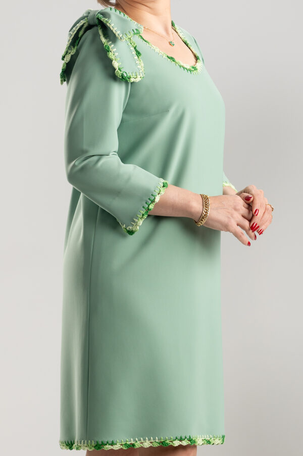 JOYCE is the single- shouldered Bow Dress